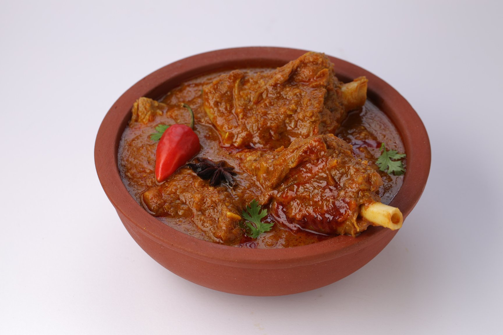 Mutton curry  or Lamb curry_white background